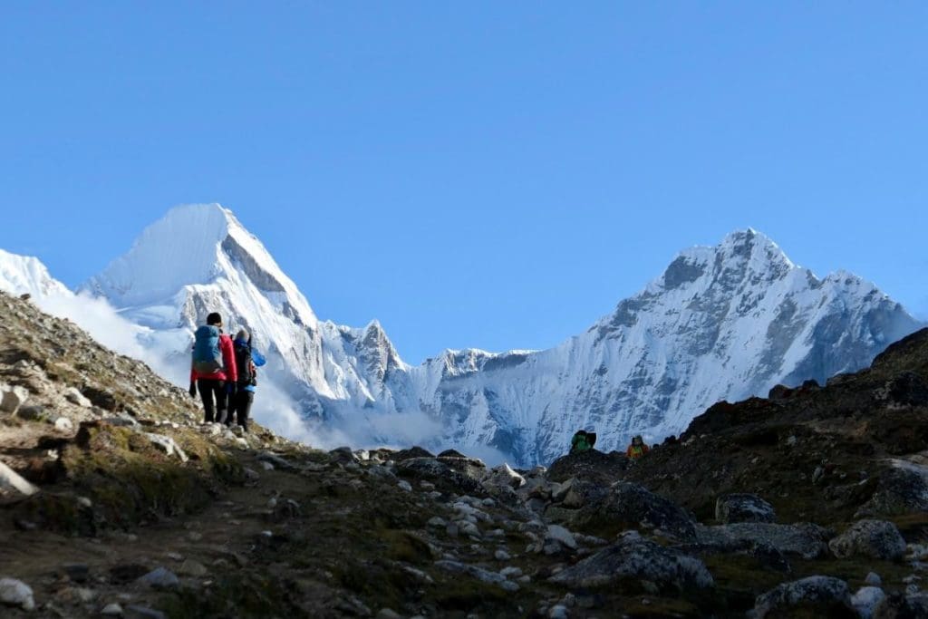Climber facing Mount Everest during a climb to the summit