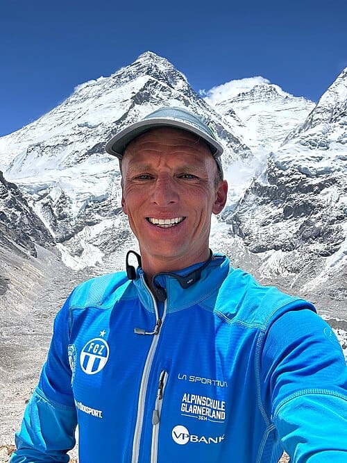 Solo hiker on the trail climbing Mount Kilimanjaro