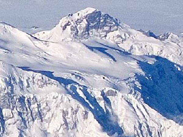 Aerial view of snow-covered King Peak in Yukon.