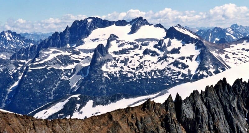 Snow-capped Mount Logan viewed from a nearby peak.