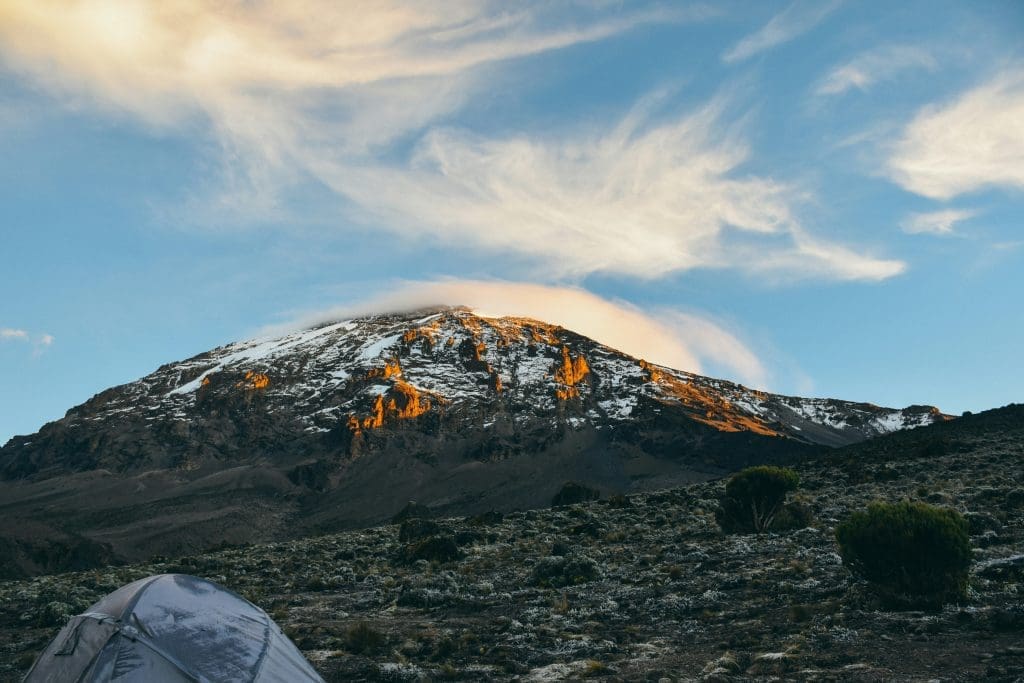 Climbing Mount Kilimanjaro in Tanzania is a popular adventure similar to the Annapurna Base Camp Trek
