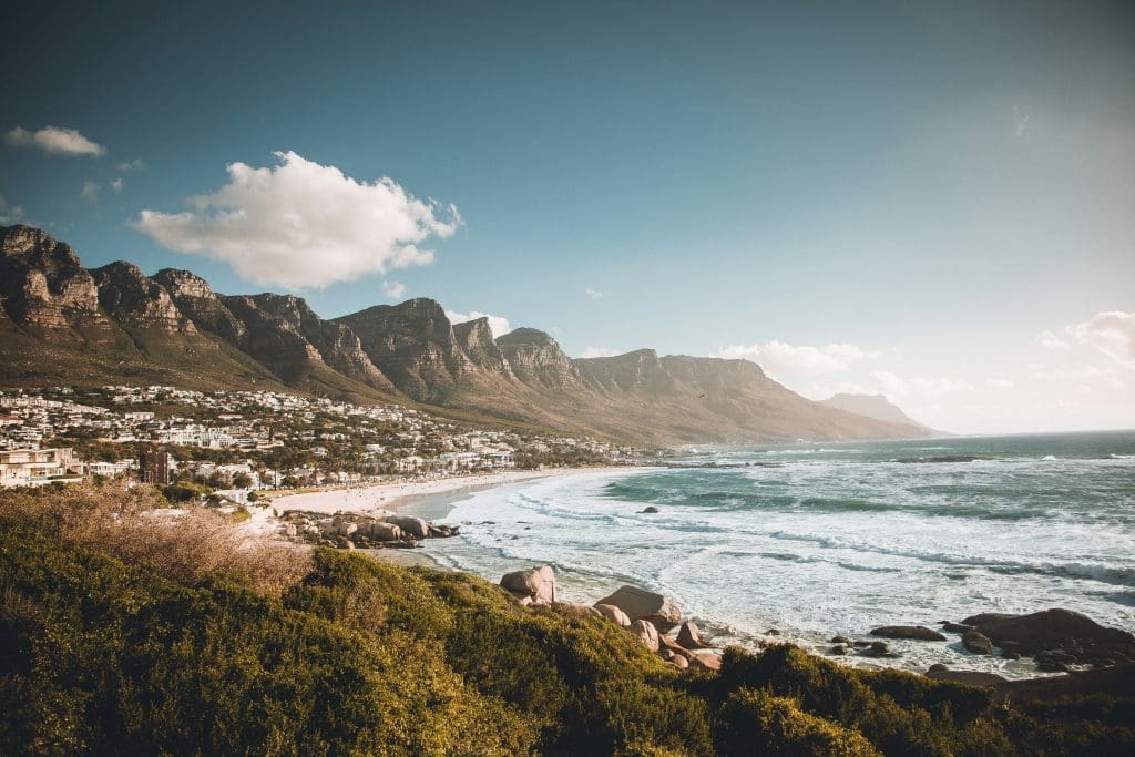 The seaside view of Camps Bay Beach, located in Cape Town, South Africa